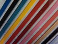 Striped fabric samples in rainbow colors